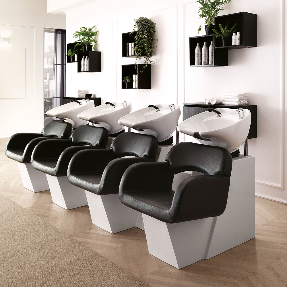 Hair Sage washing unit with white base and black chair