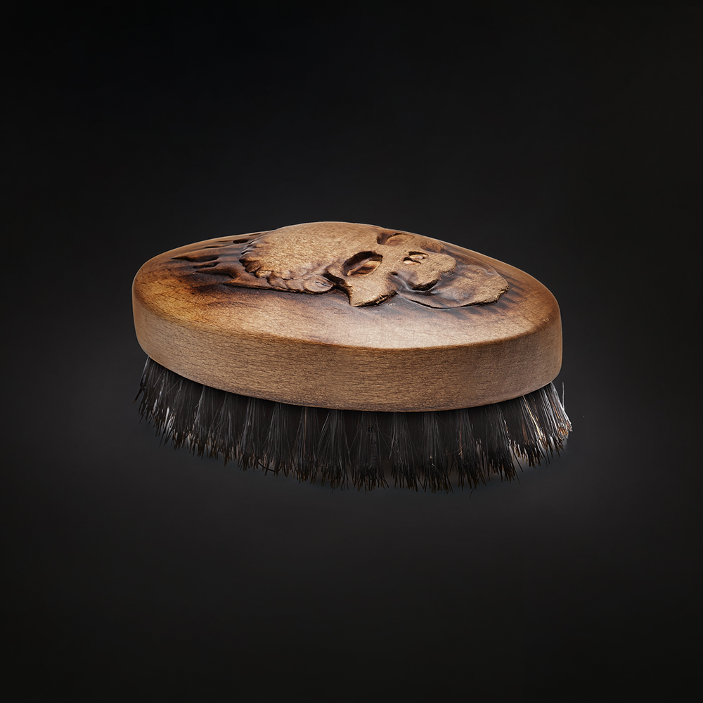 Skull oval palm brush
